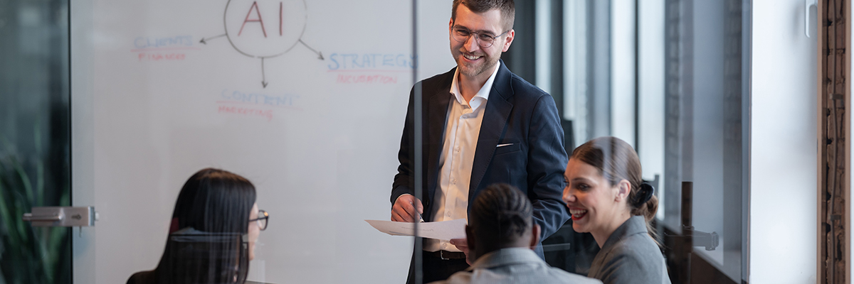 Diverse business team in a modern office during a meeting, discussing artificial intelligence strategy. Concept of AI innovation, teamwork, leadership, corporate planning, professional collaboration.