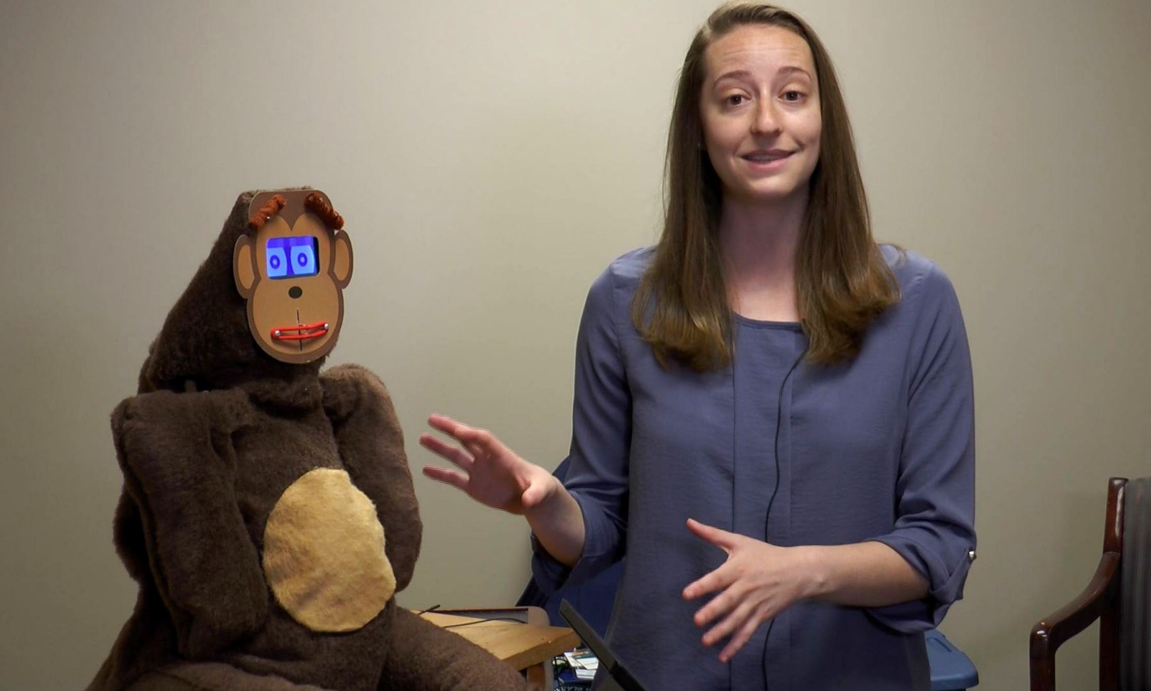Medical Student Jenna Lebersfeld with SAM the social robot.