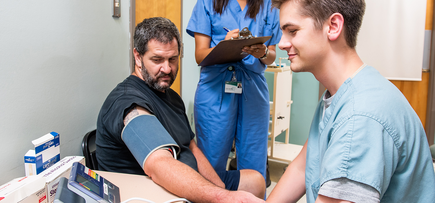 Two EAB doctors with a patient