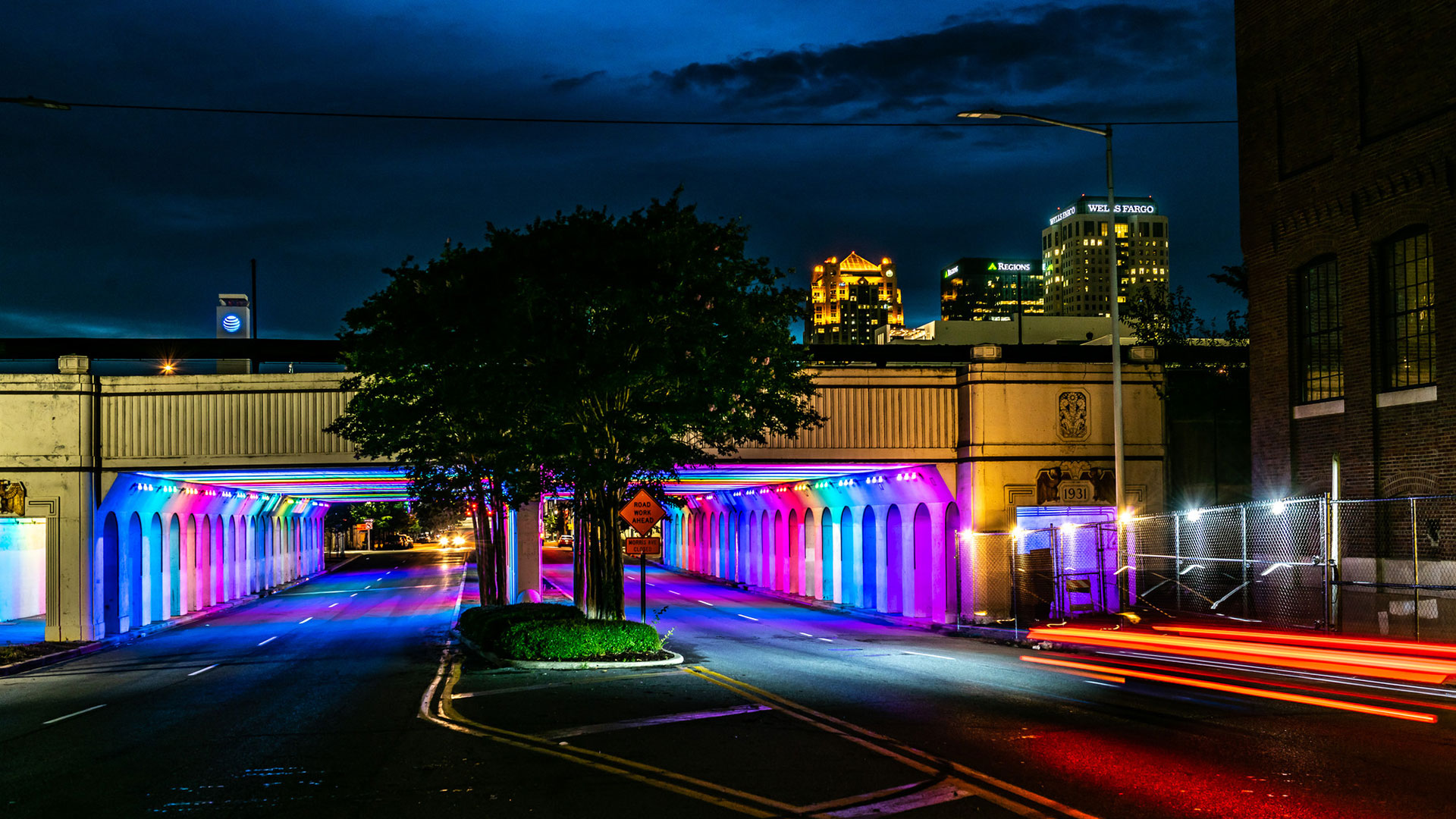 bridge with neon lights underneath