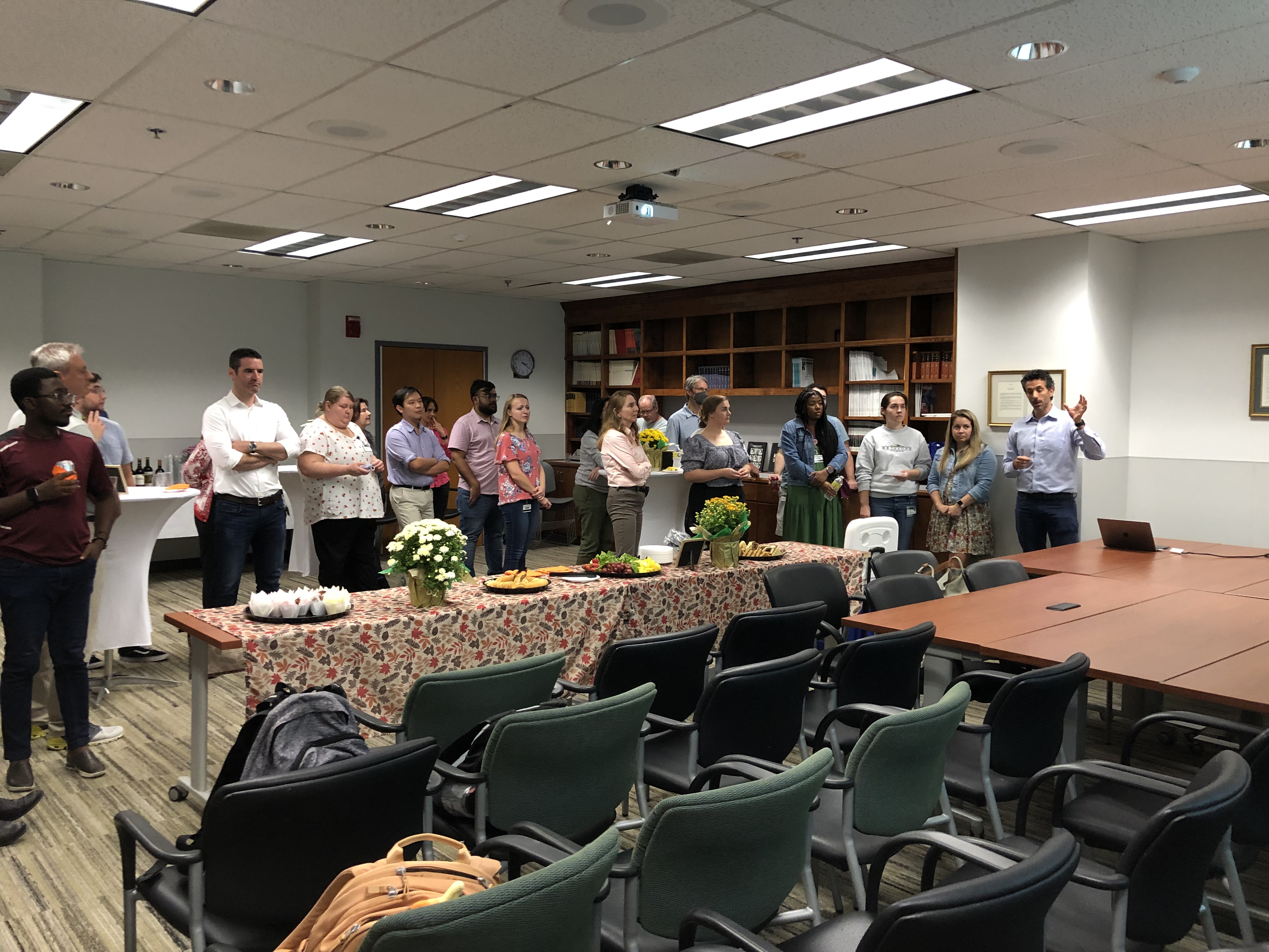 Scholars listening to the presentation