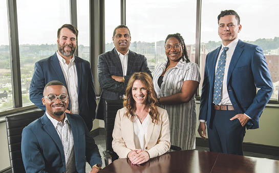 A group portrait of members of the Marnix E. Heersink Institute for Biomedical Innovation team. 