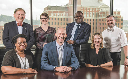 A group portrait  of members of the Mary Heersink Institute of Global Health team. 