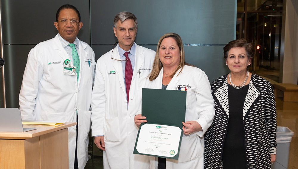 Dr. Kristen Riley is honored for her recent promotion to the rank of professor at the Nov. 15, 2018, Women in Science and Medicine Promotion Reception in the Partridge Atrium at the UAB Comprehensive Cancer Center.