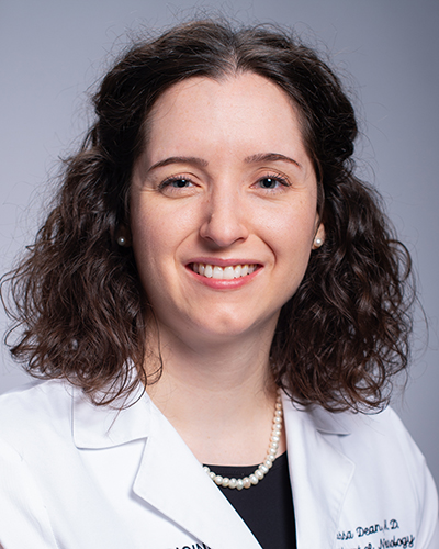 Headshot of Dr. Marissa Dean, MD (Assistant Professor, Neurology) in white medical coat, 2019.