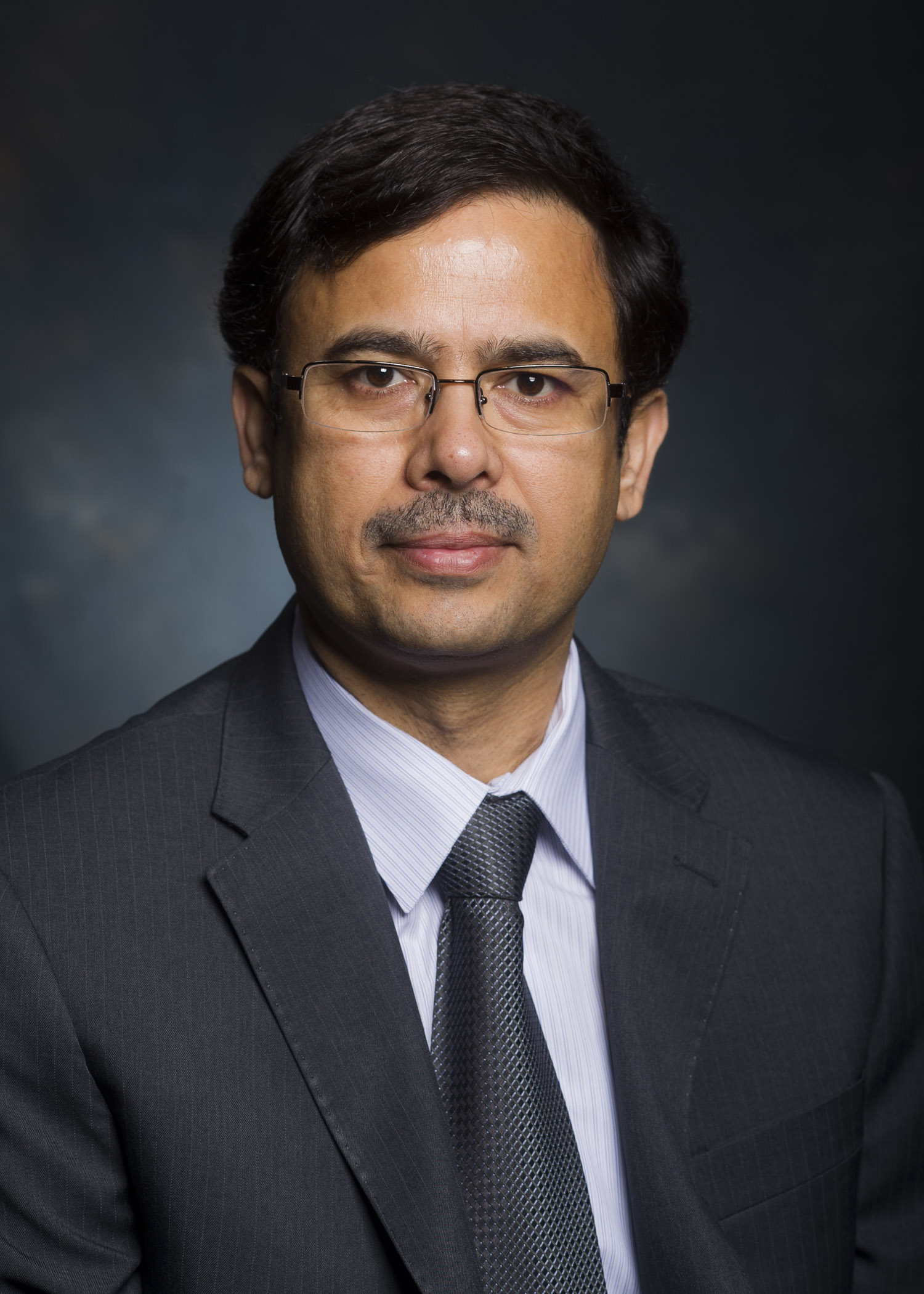 Head shot of Dr. Yogesh Dwivedi, MD (Professor, Behavioral Neurobiology).