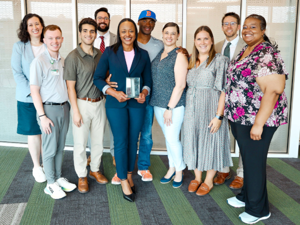 Ferguson Lecture Series organizing committee with a Olympian Vonetta Flowers