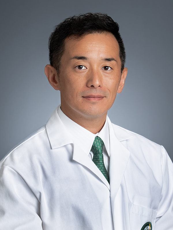 Headshot of Dr. Kazumi Taguchi, MD (Associate Professor, Urology) in white medical coat, June 2025.