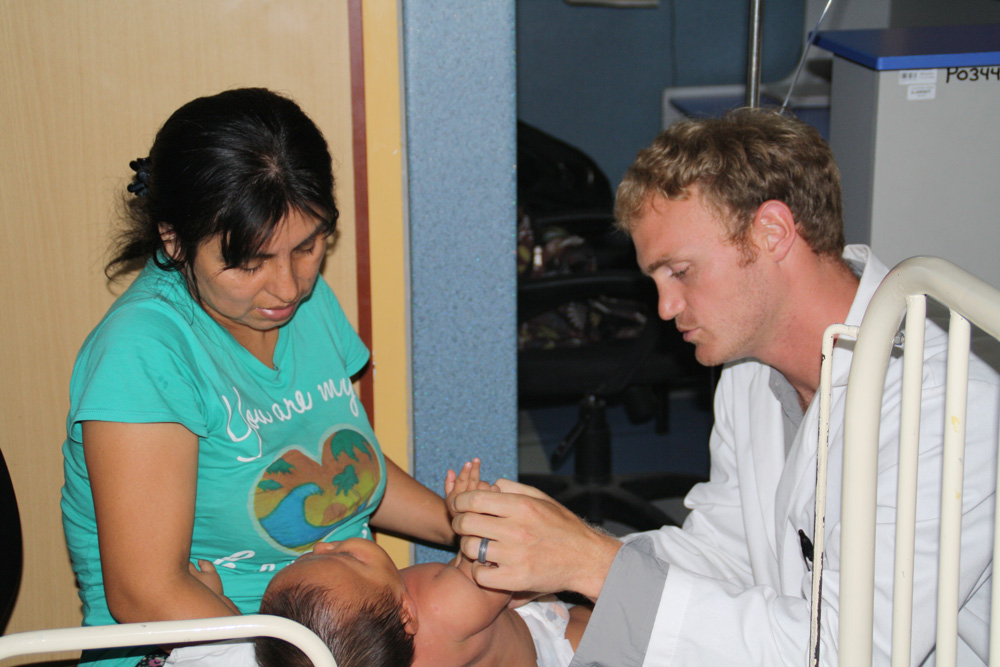 Emergency Medicine Global Health Fellow Adam White rounds in the children's ward