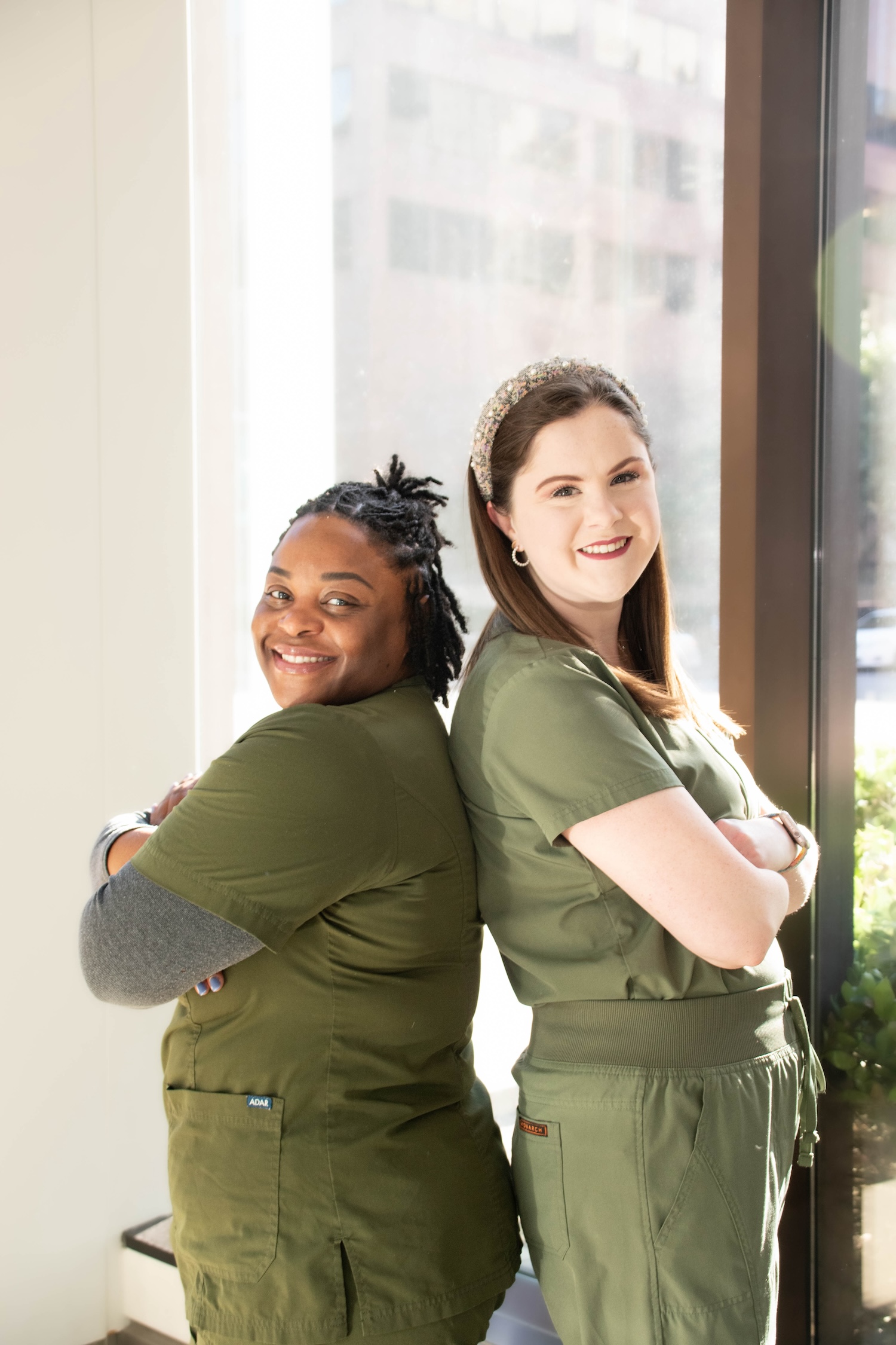 Brittany Lee,  LBSW, and Mary Katherine Grimes, LMSW, Medical Social Workers at Cooper Green