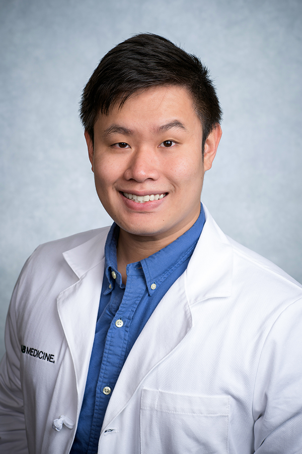 Headshot of Dr. Pongtawat Lertwilaiwittaya, MD (Resident, Internal Medicine/Genetics) in white medical coat, October 2024.