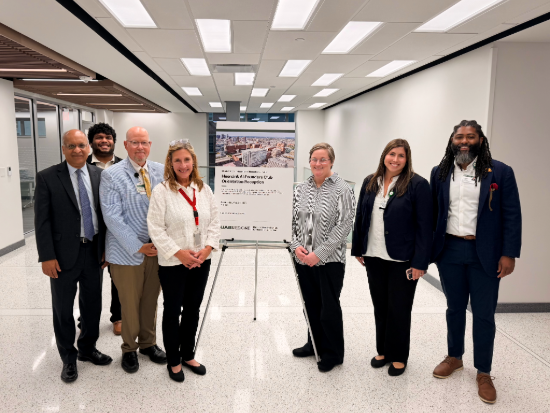 A group photo with Anupam Agarwal, M.D., MHIBI staff, and the Heersink AI Founders.