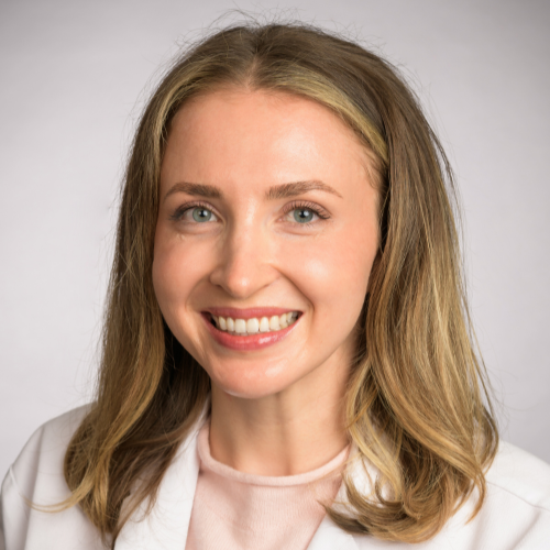Headshot of a smiling female optometrist