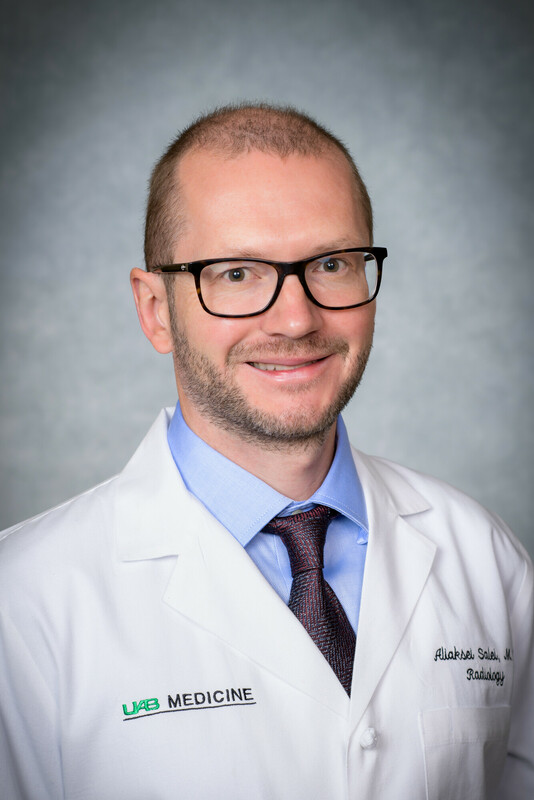 salei headshot in white coat