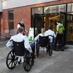 Medical students learn about health equity for wheelchair users during Come Roll with Me