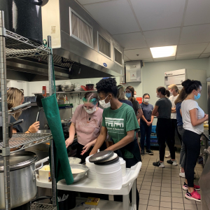 Women empowering women: UAB chapter of AWS volunteers with First Light serving breakfast