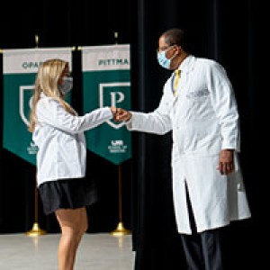 School of Medicine welcomes 2021 entering class with two White Coat Ceremonies