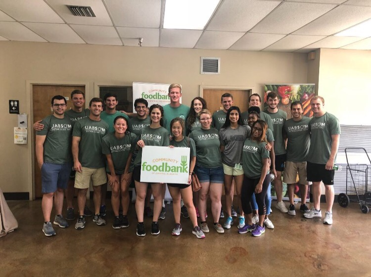 Barfield-Carter LC volunteering at the Community Foodbank of Central Alabama