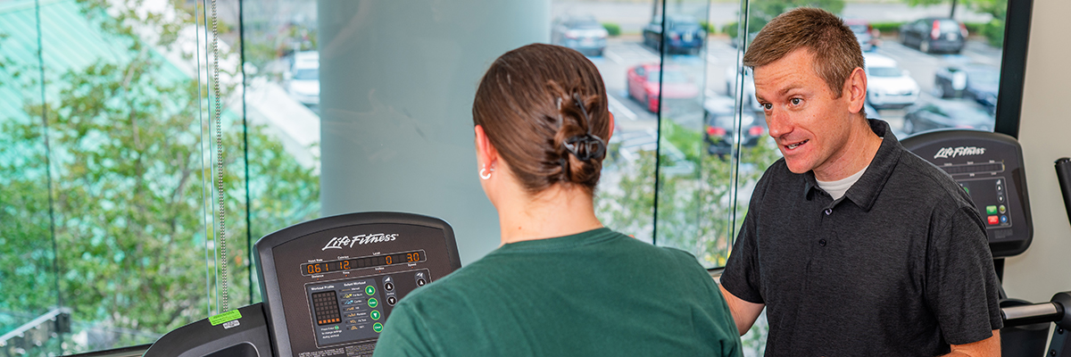 Sports Medicine faculty working with patient