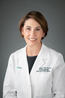 Edie Hapner white coat 1