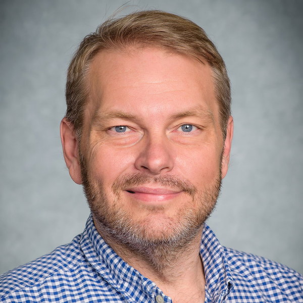 Professional headshot of Michael Busbin