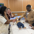 MMS Participants Examining A Toddler With AsthmaW1000