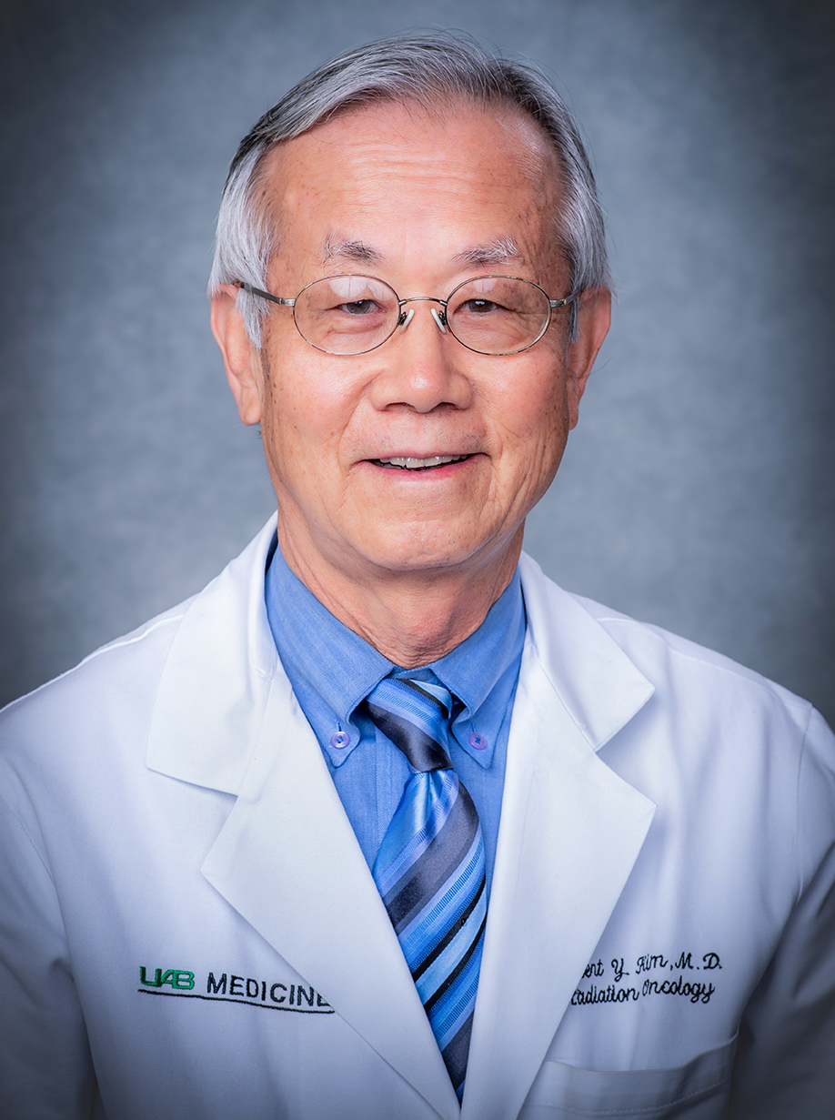Headshot of Dr. Robert Kim, MD (Professor, Radiation Oncology) in white medical coat, November 2020.