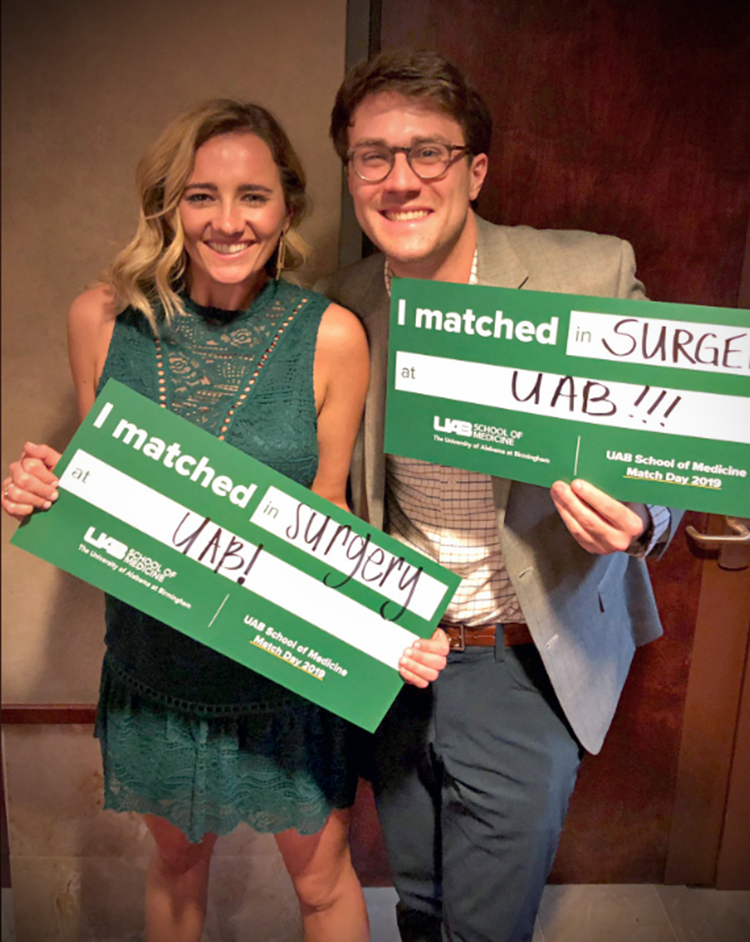 UAB medical students and soon-to-be UAB general surgery residents Shelby Bergstresser (left) and Adam Lucy (right) celebrate Match Day on Friday, March 15, 2019, at the Alys Stephens Center.