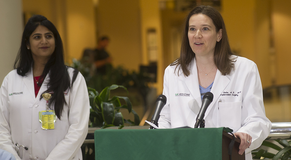 Dr. Jayme Locke speaks on the UAB Kidney Chain at a press conference in the North Pavilion Atrium in 2014.