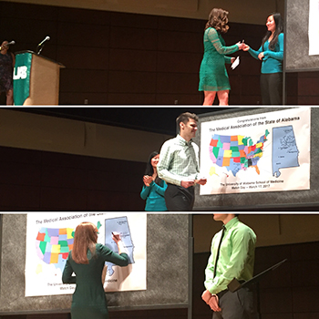 Lauren Theiss, Jozef Pavnica and Laura Bownes mark their residencies on the map at Match Day 2017 on March 17 at the Alys Stephens Center.
