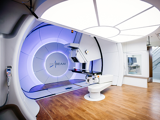 UAB Proton Therapy Center. ProBeam Proton Therapy System by Varian; the most powerful particle accelerator to treat cancer, iterative cone-beam CT imaging and high-definition pencil-beam scanning technology; enables Intensity Modulated Proton Therapy (IMPT) as well, 2020.
