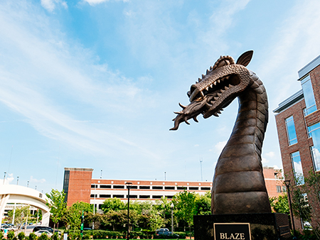 Close-up of 8-foot bronze "Blaze" statue, designed and created by Branko Medenica and donated by Ken Jackson, is the centerpiece for Blazer Pride Plaza and the main entrance to the new Collat School of Business, 2018.