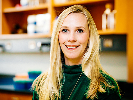 Environmental head shot of Dr. Cristin Gavin, PhD (Assistant Professor, Neurobiology) taking in a laboratory in the Shelby Biomedical Research Building, 2018.