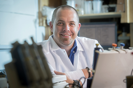 Environmental shot of Dr. Robert Sorge, PhD (Assistant Professor, Psychology) in laboratory, 2015.