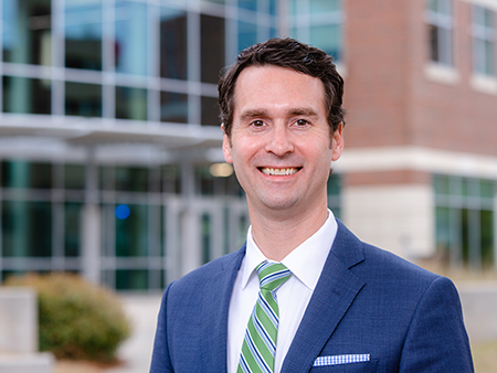 Environmental headshot of Tyler Peterson (Executive Director of Admissions and Financial Aid, Undergraduate Admissions), March 2021.