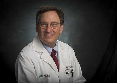 Head shot of Dr. Toby Gropen, MD (Professor, Neurology) in white medical coat, 2015.