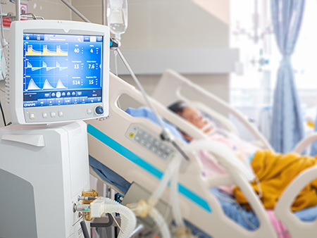 Ventilator monitor ,given oxygen by intubation tube to patient, setting in ICU/Emergency room