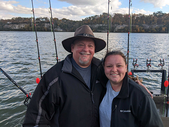 Steve Young and daughter during fishing trip 
