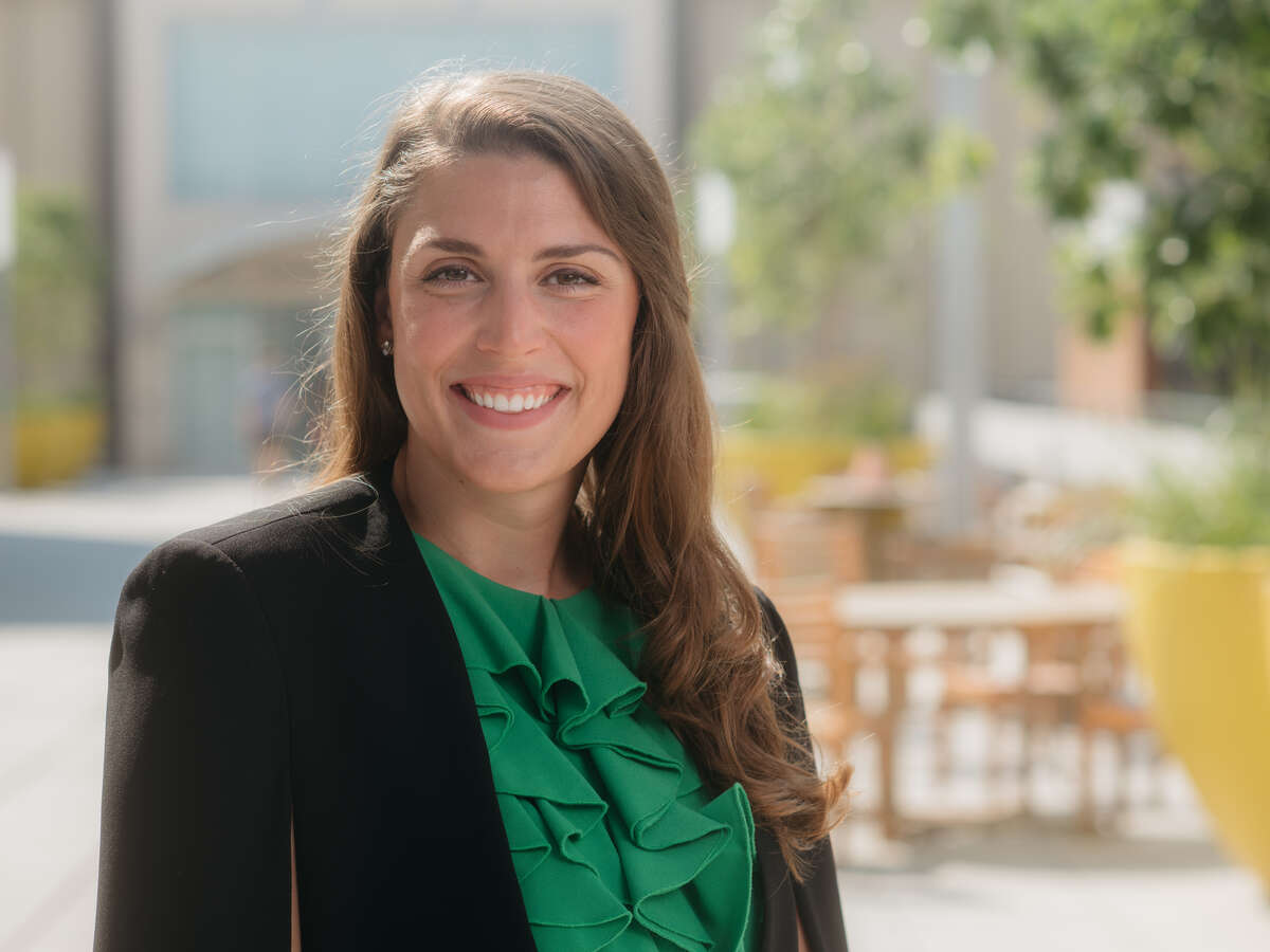 Environmental shot of Tara Harman, RDN (Instructor, Nutrition Sciences) standing outside, 2019.