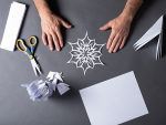 Wishing for snow? Artist cuts his own paper flakes each year