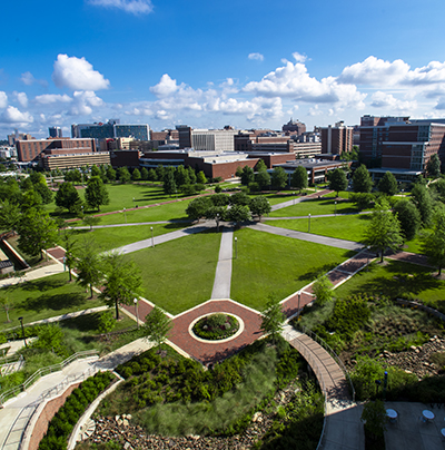 Overall view of the Campus Green, shot from the roof of University Hall, showing various university and medical center buildings in the background, July 2021.