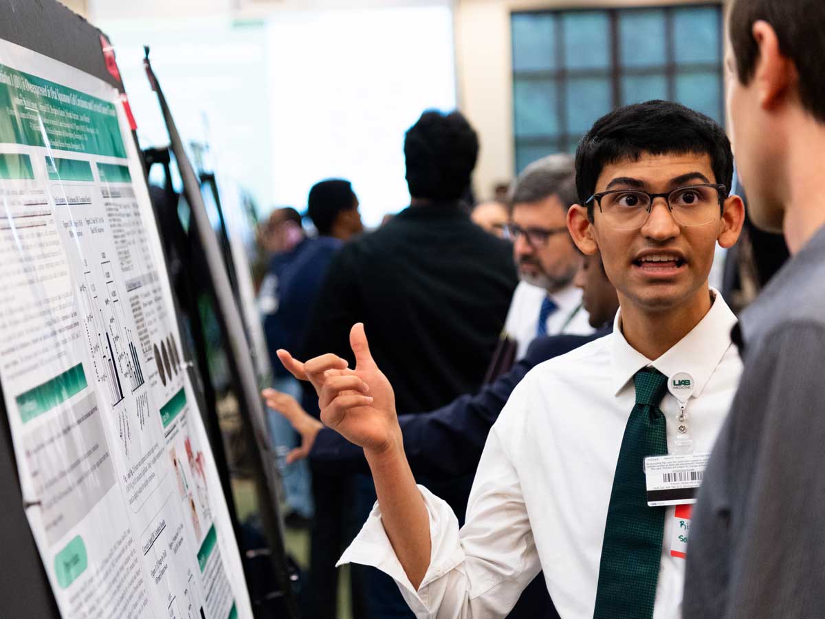 students presenting his thesis