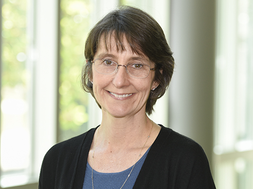 Environmental head shot of Dr. Lisa Schwiebert, PhD (Professor, Cell, Developmental, and Integrative Biology; Associate Dean, Graduate and Postdoctoral Affairs), 2018.