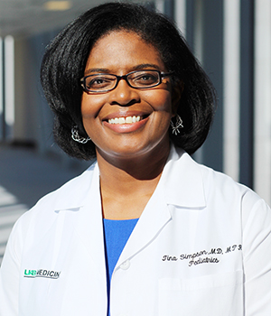 Head shot of Dr. Tina Simpson, MD, MPH (Associate Professor, Pediatrics - Adolescent Medicine) in white medical coat, 2017.