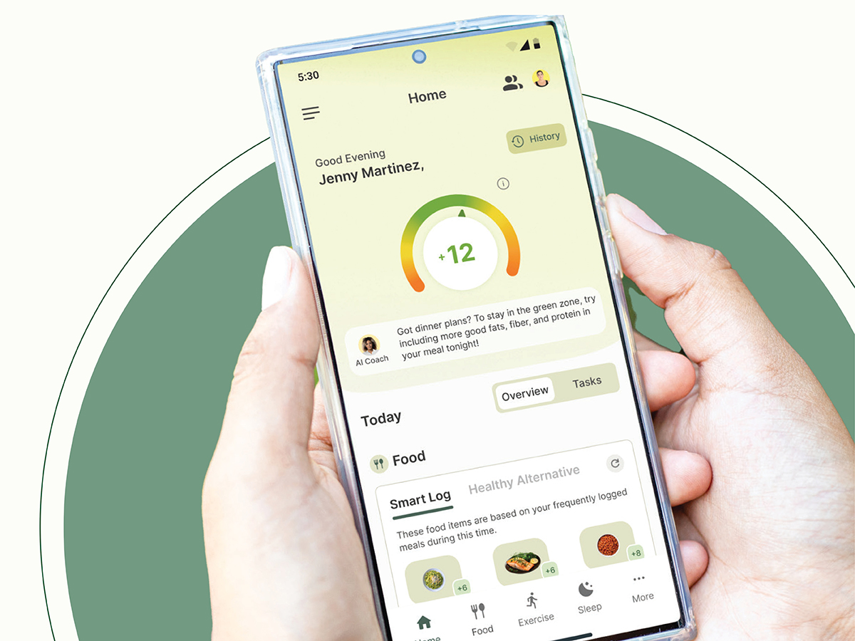 Hand holds phone displaying Nutu app