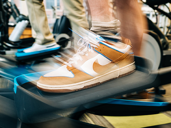 close up of feet on gym equipment