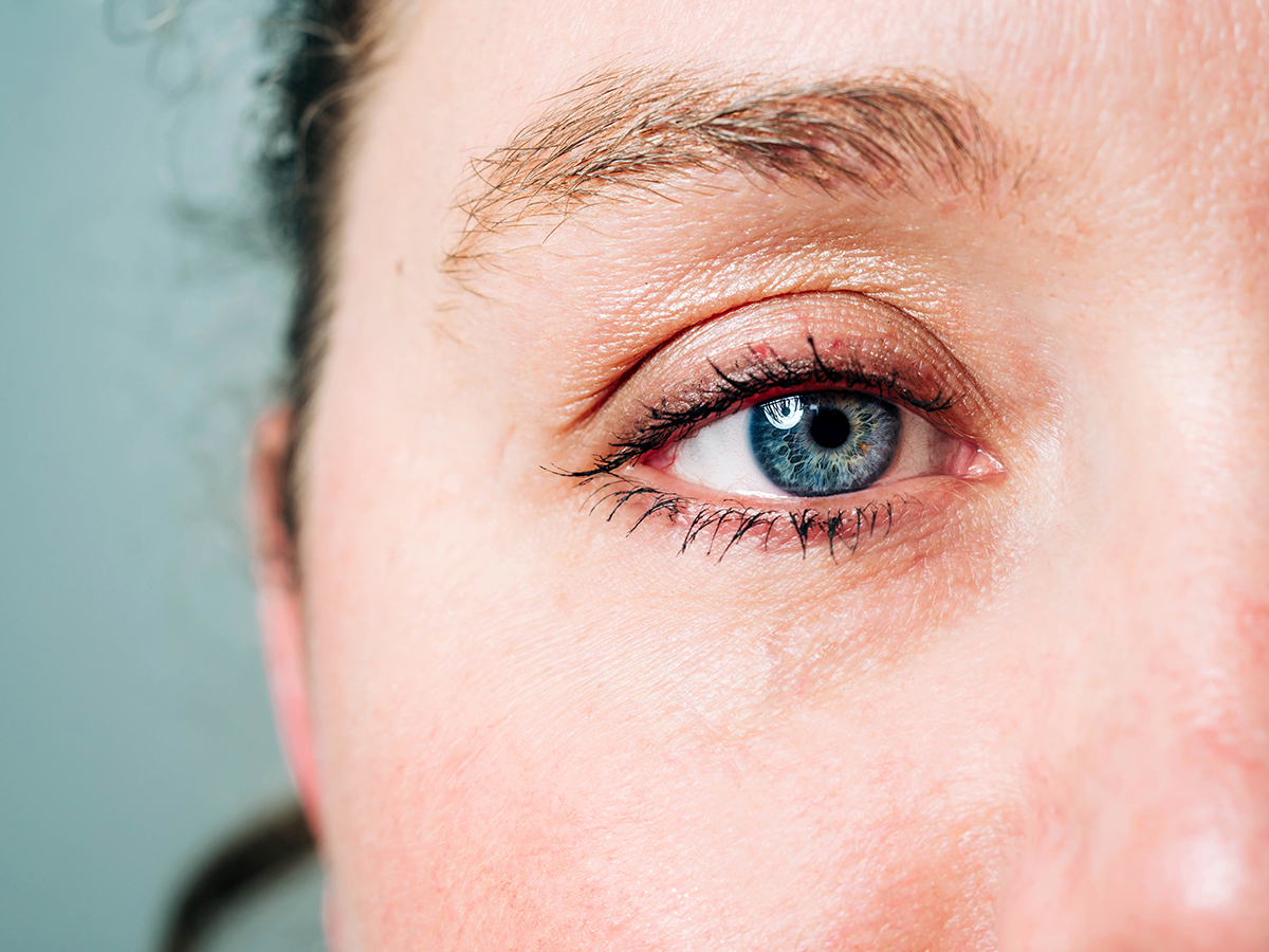 Closeup of the right eye of a model with blue eyes in the UAB studio