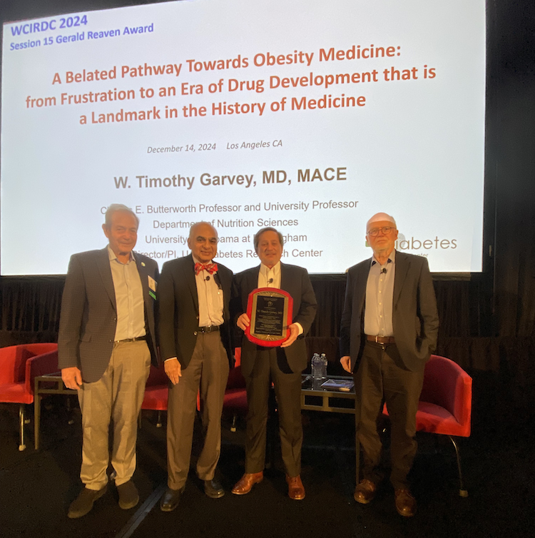 Dr. Garvey receiving award