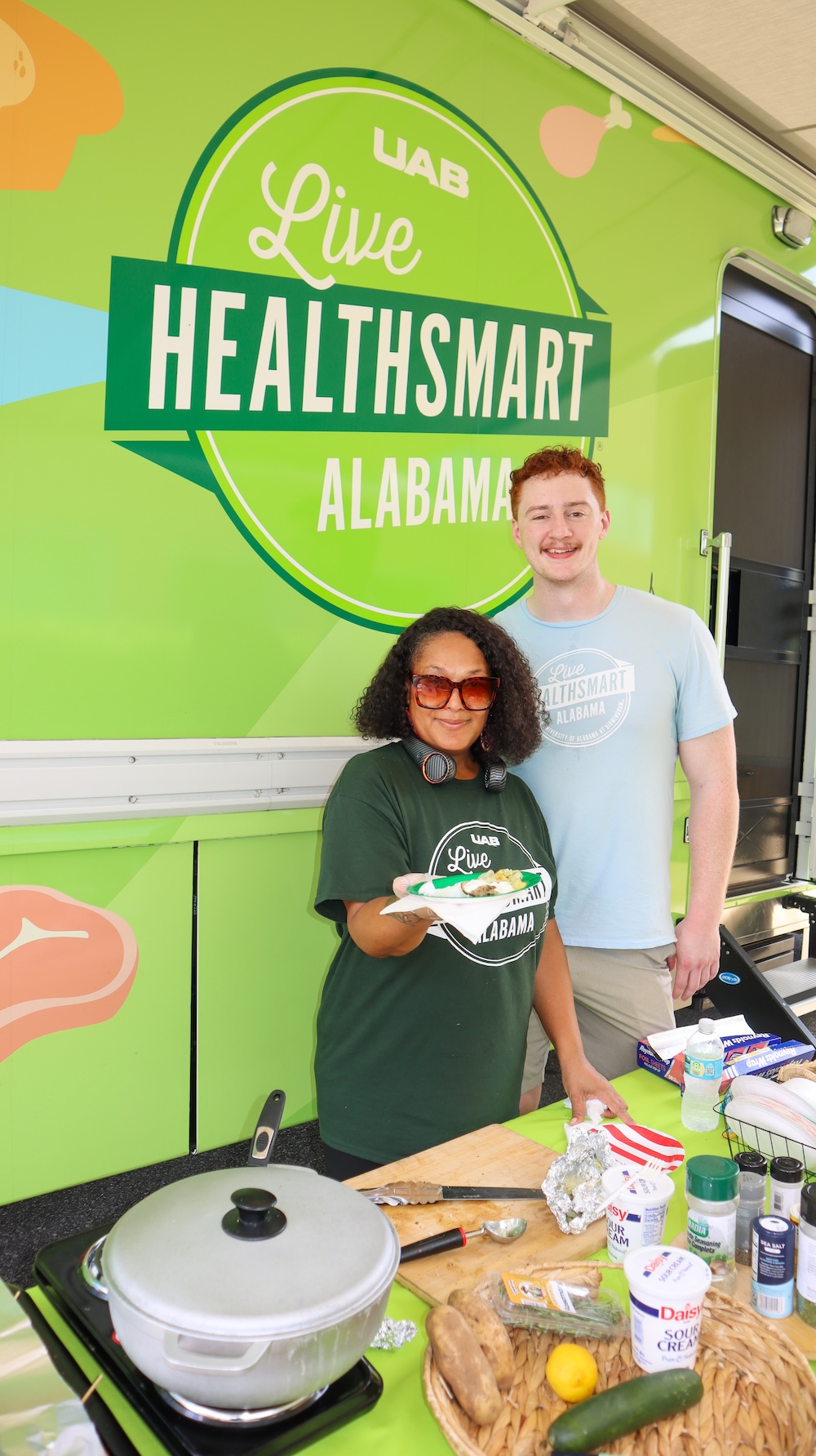 Chef Timmorah and Christopher working the Mobile Market