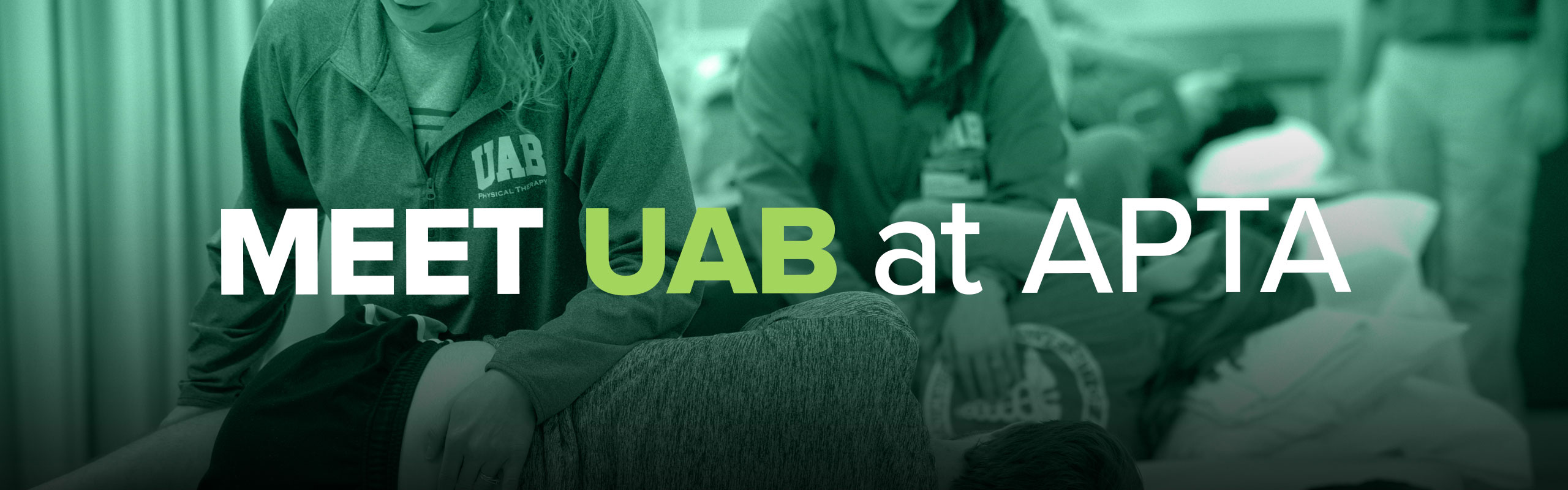 Close up of a physical therapist apply pressure to a patient's back.